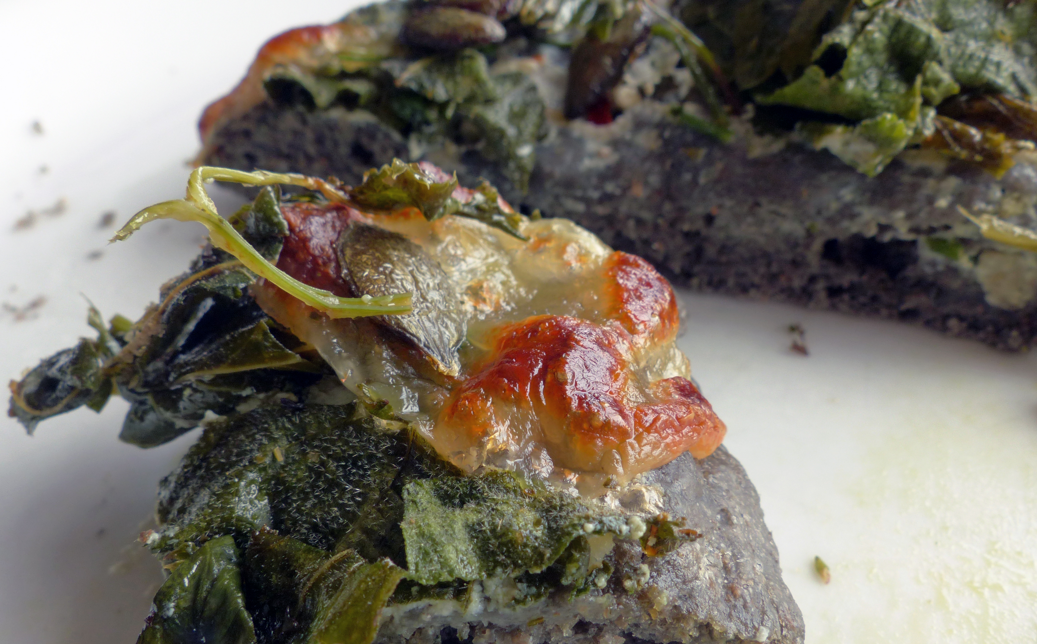 Pizza nera alla casa „WILDFIND“